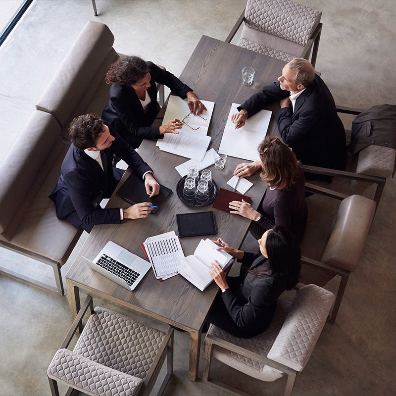 Group of lawyers working together at a conference table