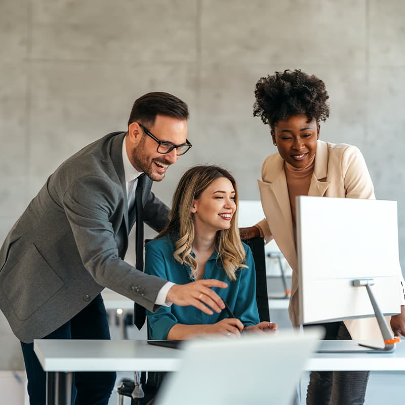 Professionals looking at Ricoh's document management solutions