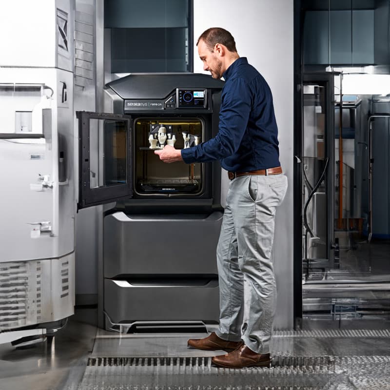 Man using 3D printer