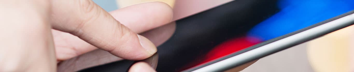 finger touching mobile phone